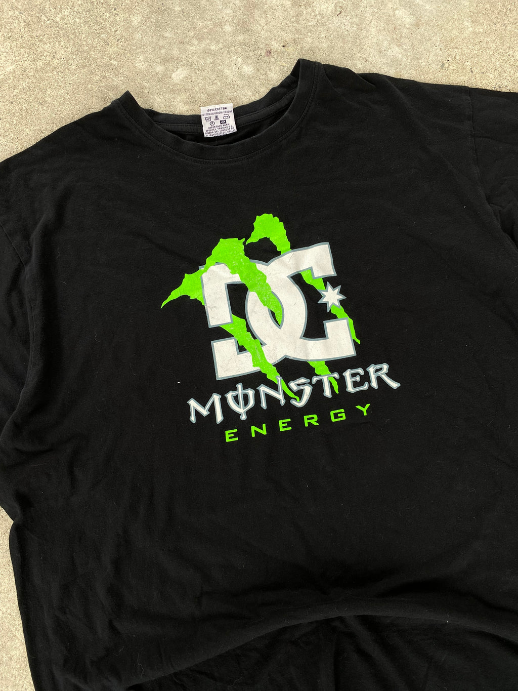 dc x monster tee “L